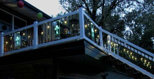 Festive deck lighting: glass panels with lights and etchings